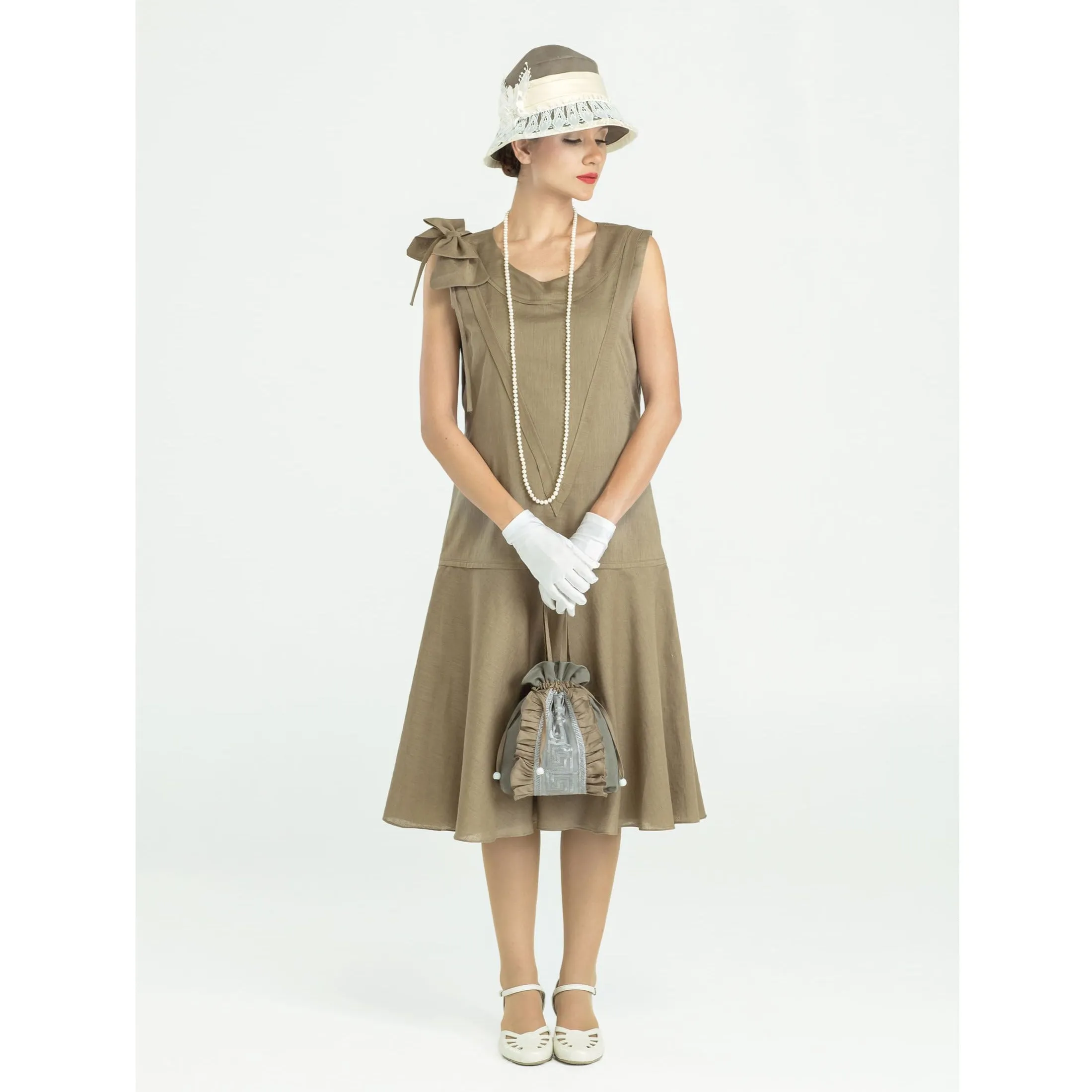 Sleeveless 1920s linen dress in olive green with bow on shoulder