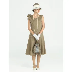 Sleeveless 1920s linen dress in olive green with bow on shoulder
